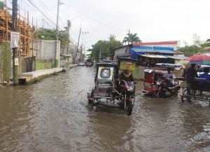 Überflutete Straße in Obando, Metro Manila, Philippinen, Foto: Simon Gehrmann